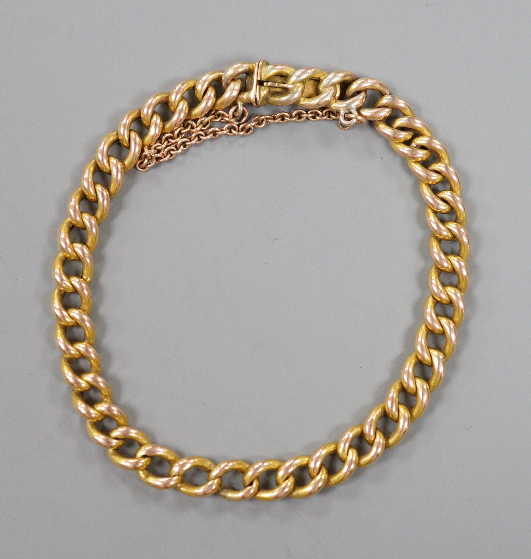 A 9ct curb link bracelet, 18cm, 7.5 grams.